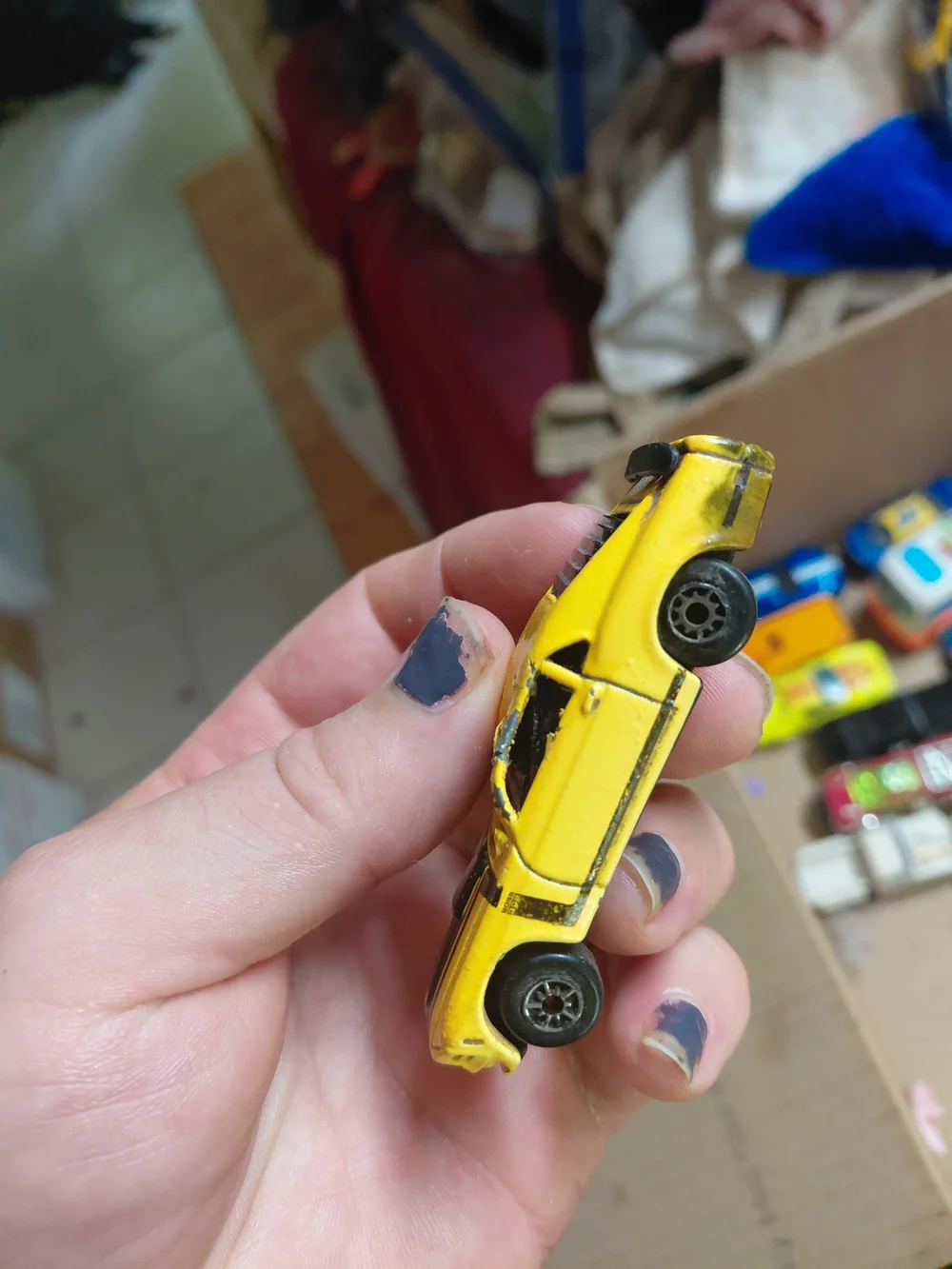 1:64 scale die-cast model of a 1970 Ford Mustang Boss 302,